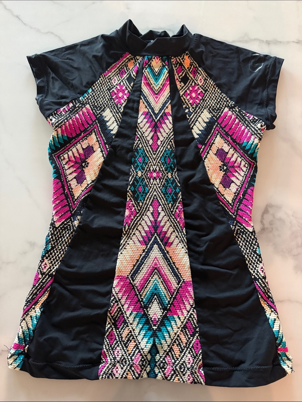Rip Curl Black Top with Pink, Teal & Cream  Lycra top, ideal for swimming.
